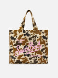 Borsa Essential in canvas con stampa muccata e logo stampato